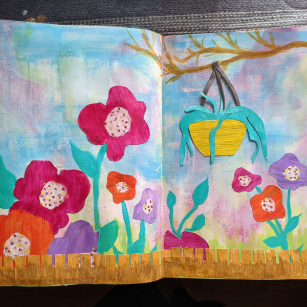 Image of art journal spread of flowers, a fence and a tree